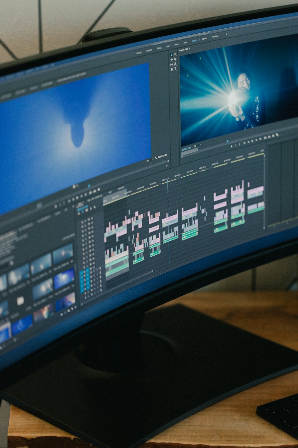 Computer monitor displaying video editing software timeline.